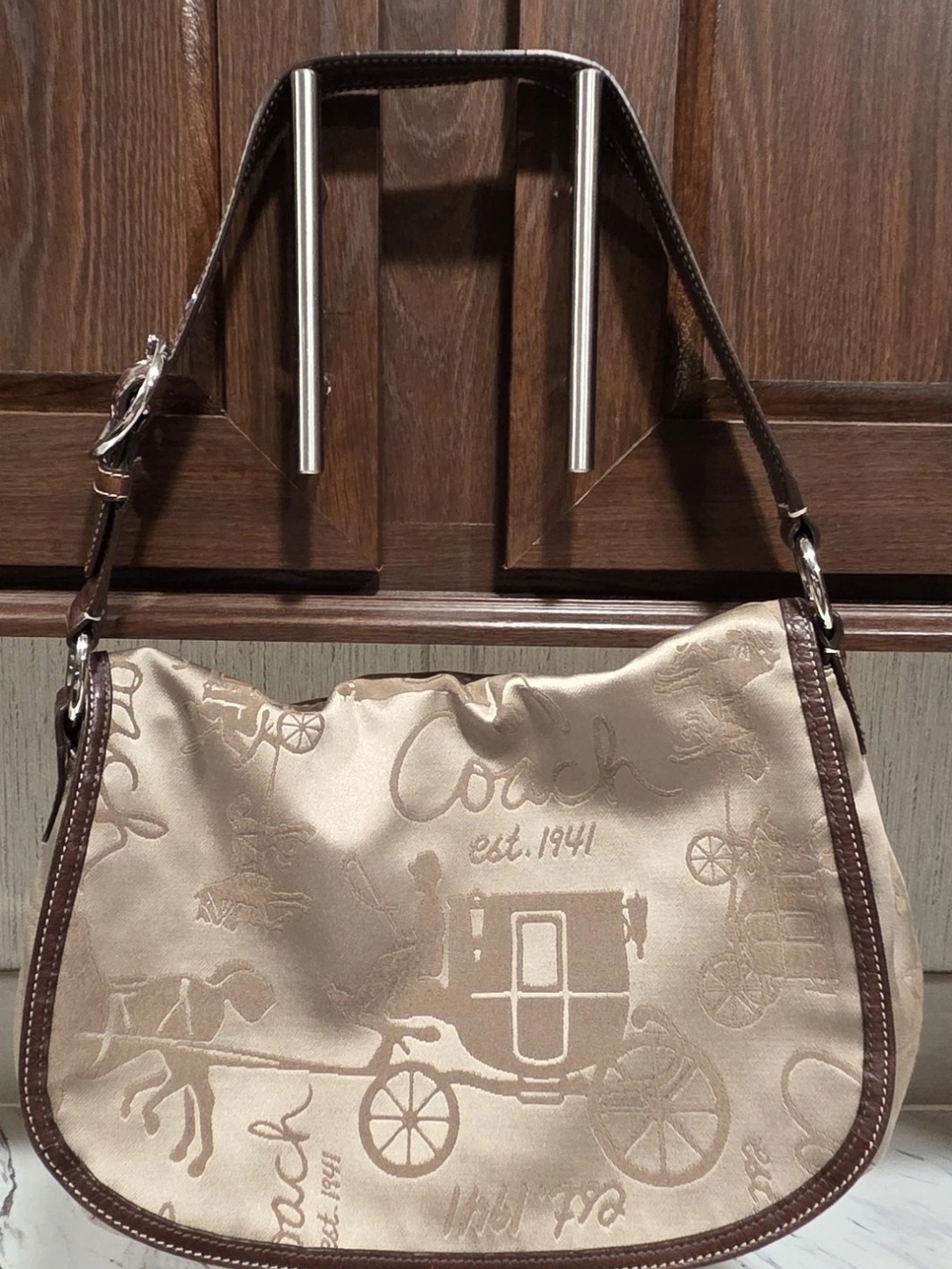 Coach Beige Signature Horse And Carriage Hobo Bag with Brown Trim